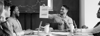 employee-showing-paper-with-graph-diagram-sitting-2023-11-27-05-01-44-utc-1.jpg employee-showing-paper-with-graph-diagram-sitting-2023-11-27-05-01-44-utc-1.jpg
